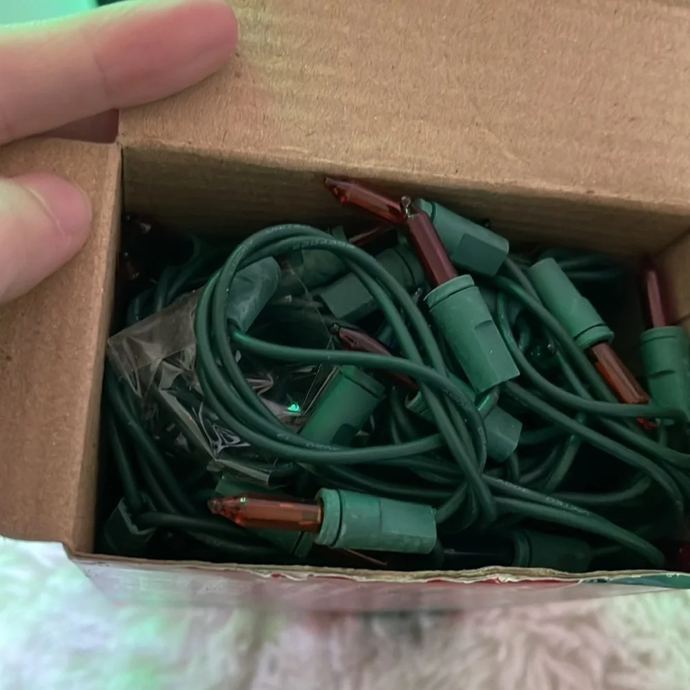 2 sets of 100 color Xmas lights on a string all work uses one never used again